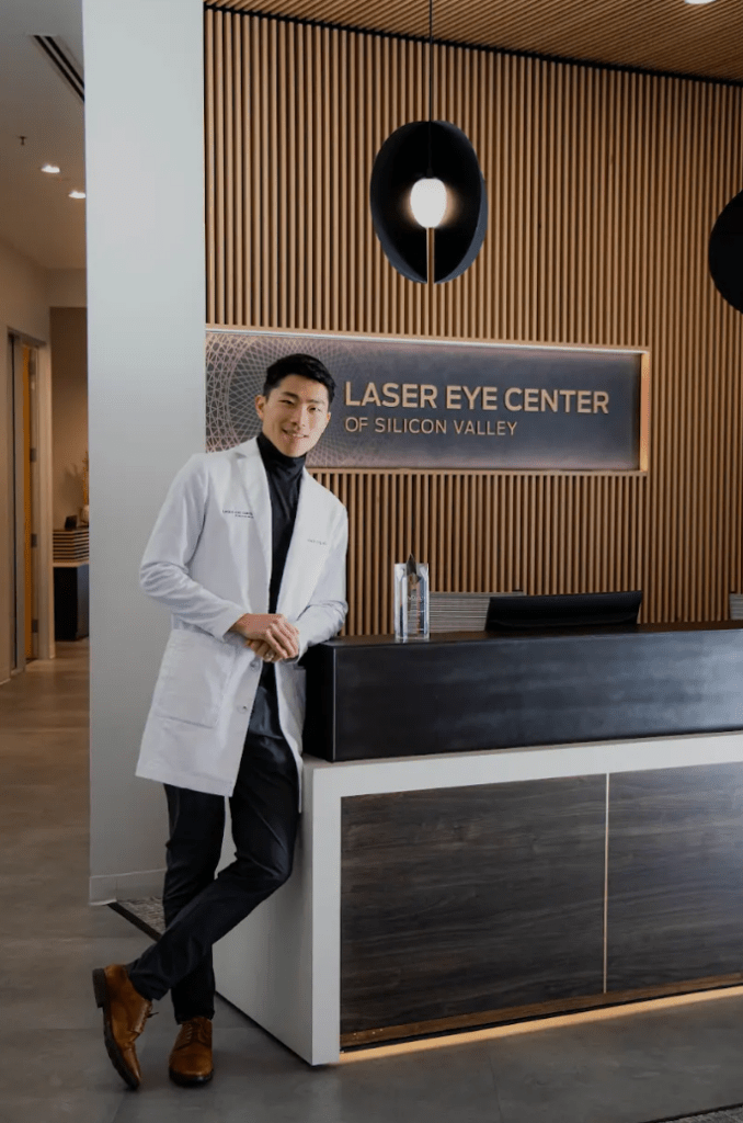 Dr. Ling by the front desk of Laser Eye Center of Silicon Valley